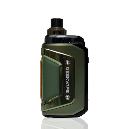 A GEEKVAPE vape device in a metallic olive green finish with black accents, shown from a front-three-quarter angle on a white background with a subtle reflection.